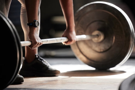 a man is preparing doing barbell deadlift